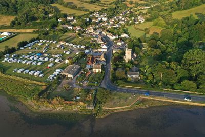 High angle view of village on river estuary 