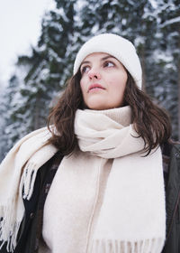 Portrait of a beautiful young woman in winter