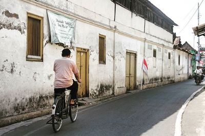 Man walking on road