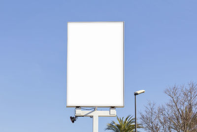 Low angle view of street light against clear sky