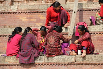 Men sitting on steps