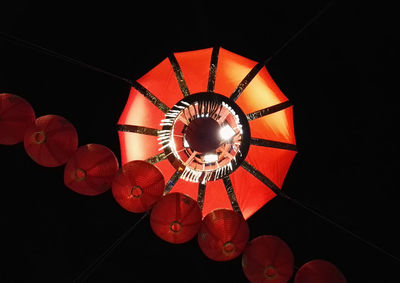 Low angle view of illuminated ceiling