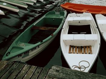 High angle view of boats moored at harbor