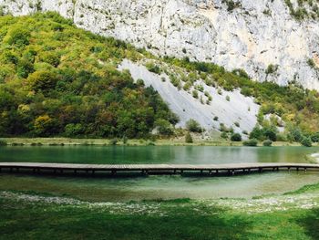 Scenic view of lake by mountain