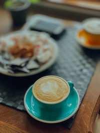 High angle view of coffee on table