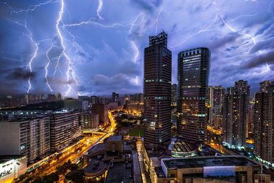 Lightning strike against illuminated buildings
