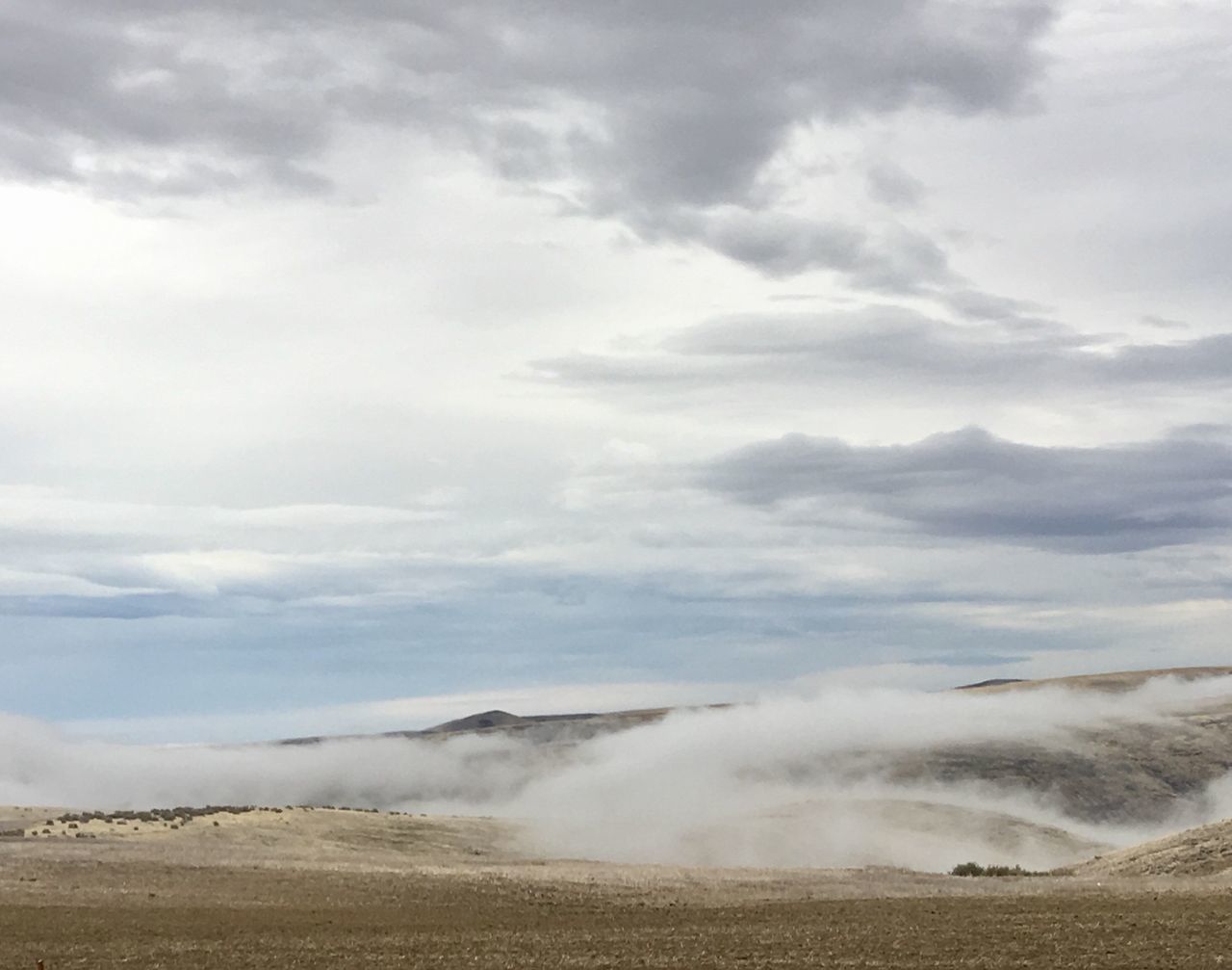 cloud - sky, sky, landscape, beauty in nature, environment, scenics - nature, day, nature, tranquil scene, tranquility, no people, land, non-urban scene, outdoors, field, horizon over land, transportation, desert, horizon, dust, power in nature, arid climate