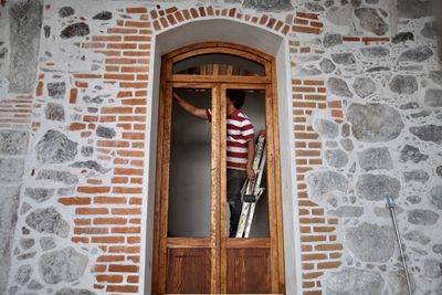 Entrance of building worker building door carpinteria construccion