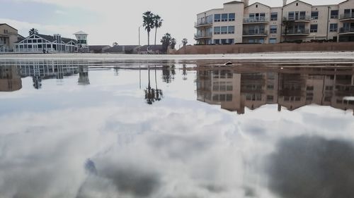 Reflection of buildings in lake