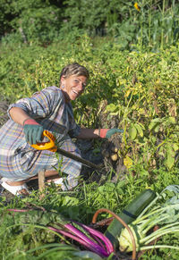 Portrait of senior man working at farm
