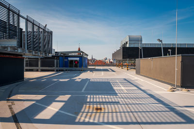 Car parking on the roof of the building with the city skyline in the background