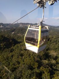 Overhead cable car against mountains