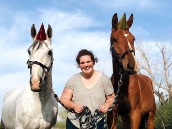 Portrait of man riding horse