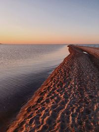 Scenic view of sea against sky at sunset