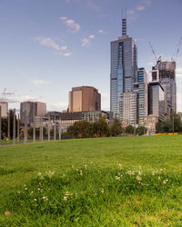 View of buildings in city against sky