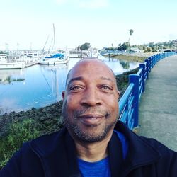 Portrait of smiling mid adult man in boat
