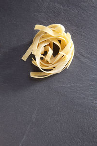 Close-up of pasta on slate