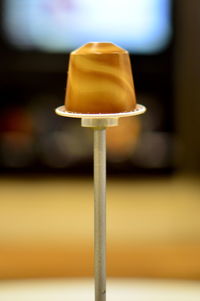 Close-up of ice cream cone on table