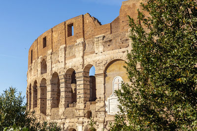 Low angle view of old ruins against clear sky