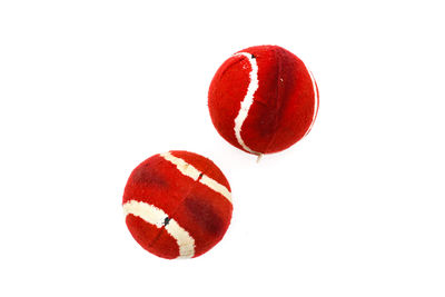 Close-up of red ball against white background