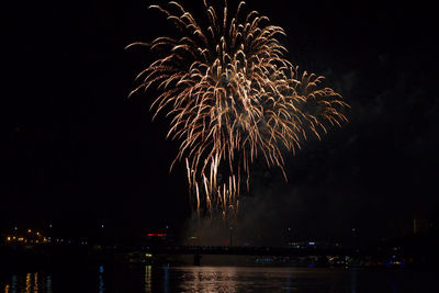 Firework display at night