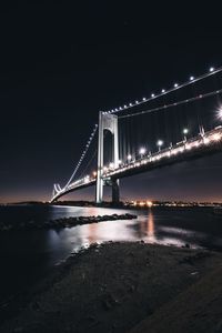 View of suspension bridge at night