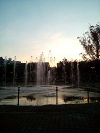 Fountain with trees in background