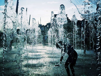 Woman standing in water