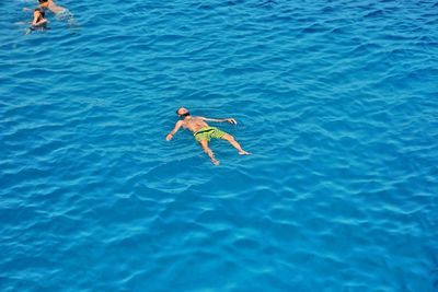 High angle view of man swimming in pool