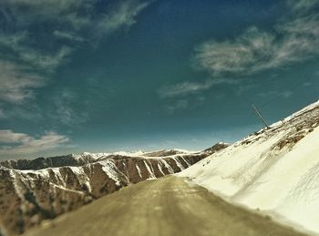 Scenic view of snow covered mountains