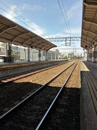 Railroad station platform against sky