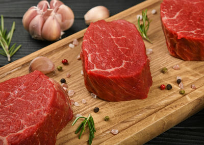 High angle view of meat on cutting board