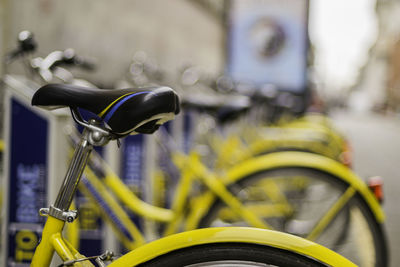 Close-up of yellow bicycle