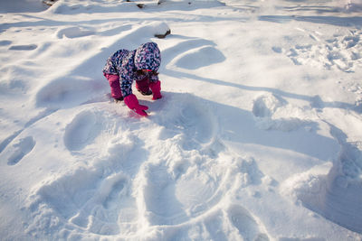 High angle view of snow covered field