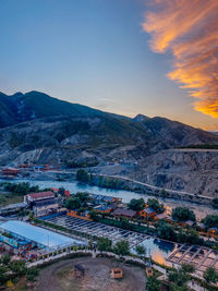 High angle view of cityscape against sky during sunset