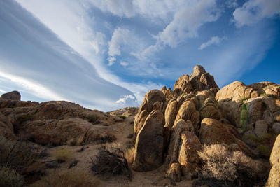 Sierra wave lenticular cloud formation over desert rock formations