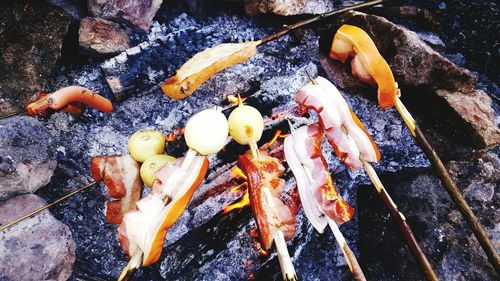 Close-up of meat on barbecue grill