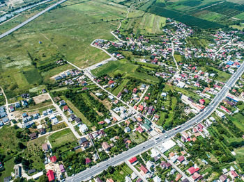 High angle view of trees and buildings in city