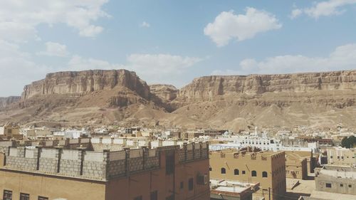 Panoramic view of ancient buildings against sky