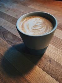High angle view of cappuccino on table