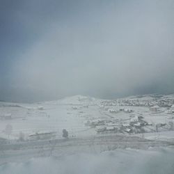 Scenic view of snow covered landscape