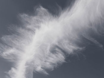 Low angle view of smoke against sky