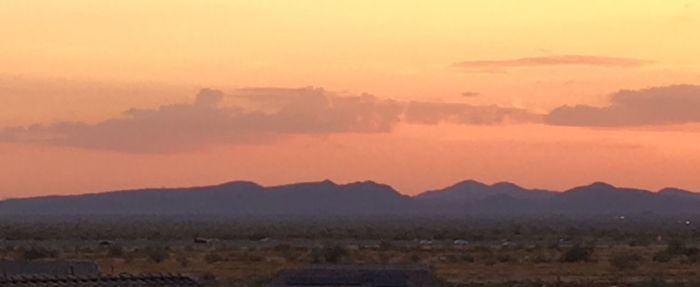 Scenic view of silhouette landscape against sky during sunset