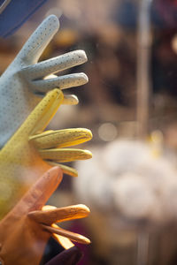 Close-up of leather gloves in shop