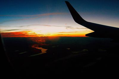 Aerial view of landscape at sunset