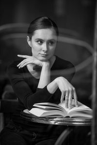 Portrait of woman sitting on seat