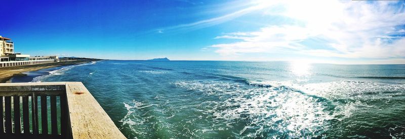 Scenic view of sea against blue sky