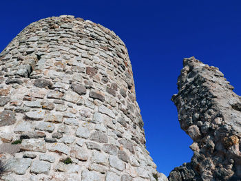 View of the fortress of tolfa, a beautiful lazio village in italy