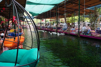 Boats in canal at amusement park