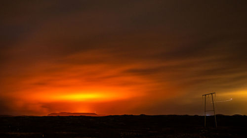 Scenic view of dramatic sky during sunset